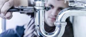 Plumber Fixing Water Leak