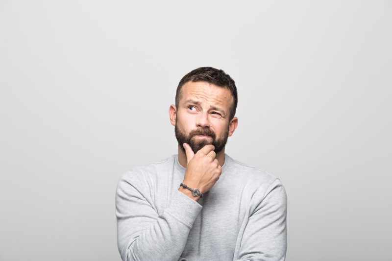 Man Thinking About Scheduling Ice Machine Repair